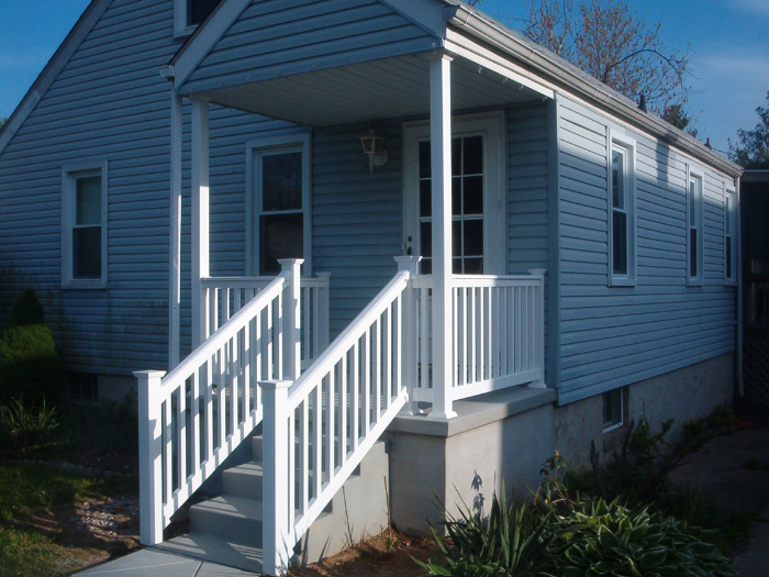 FRONT PORCH RAILING WITH WHITE VINYL AND WHITE WHITE SQUARE PICKETS AND WHITE POSTS
