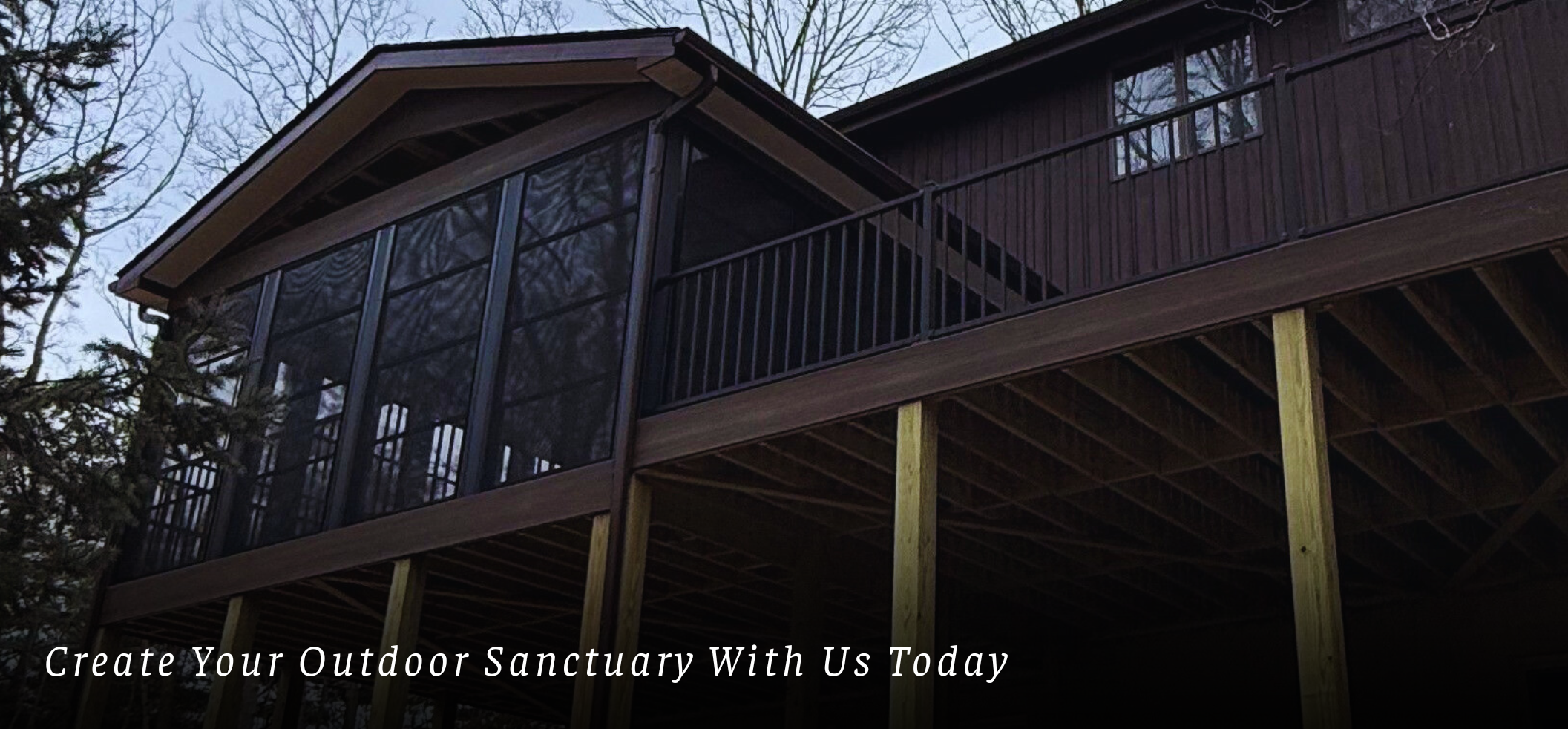 Eze-Breeze four-track three-season room with brown composite decking installed in Baltimore County MD