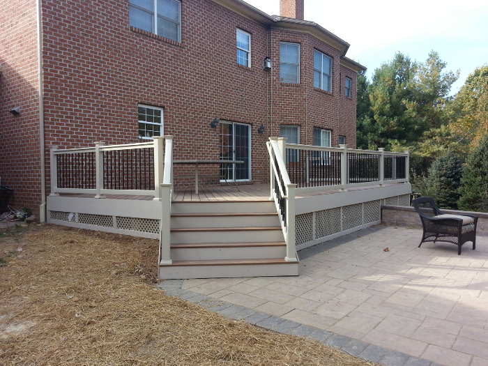 Brown deck with tan railing and diamond lattice