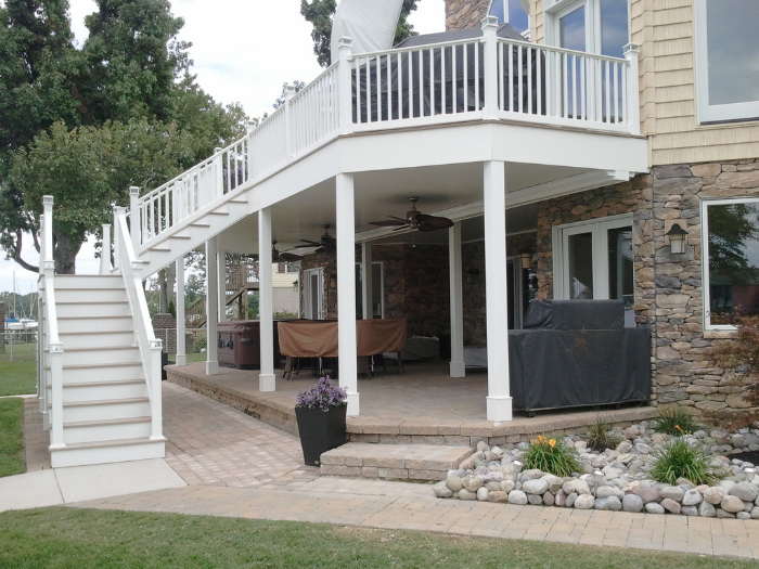 Gray deck with white vinyl railing