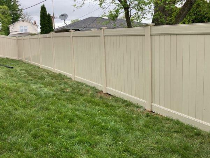 Solid privacy vinyl fence installed by Creative Vinyl Products