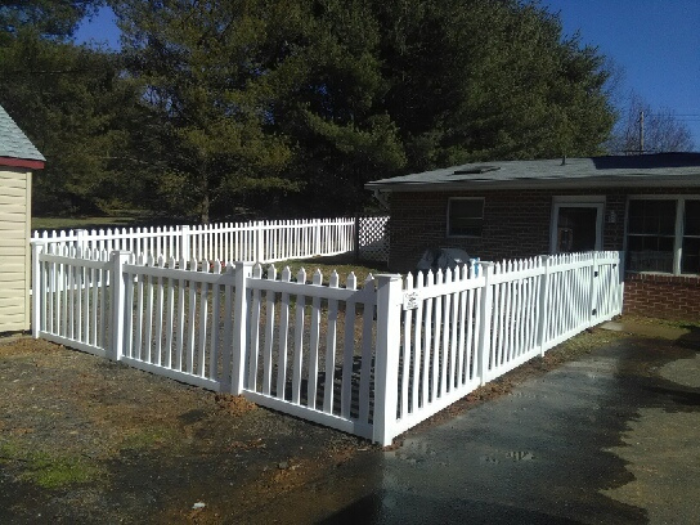 White vinyl picket fence installation in Maryland